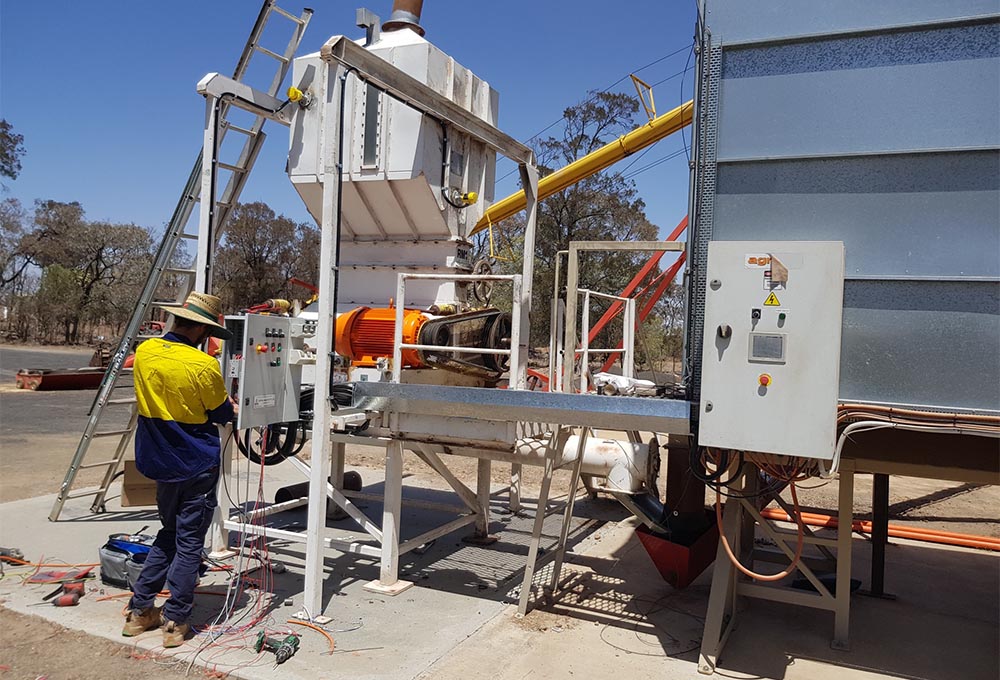 Control Unlimited team member working on start/stop cabinet on site